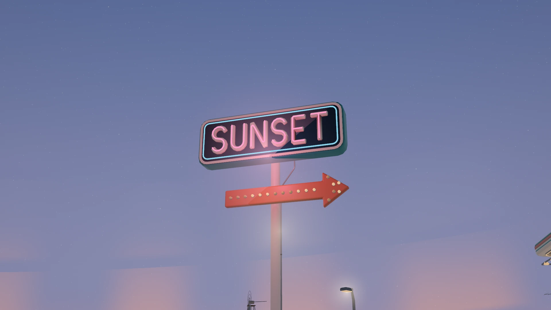 The SUNSET neon sign against the evening sky